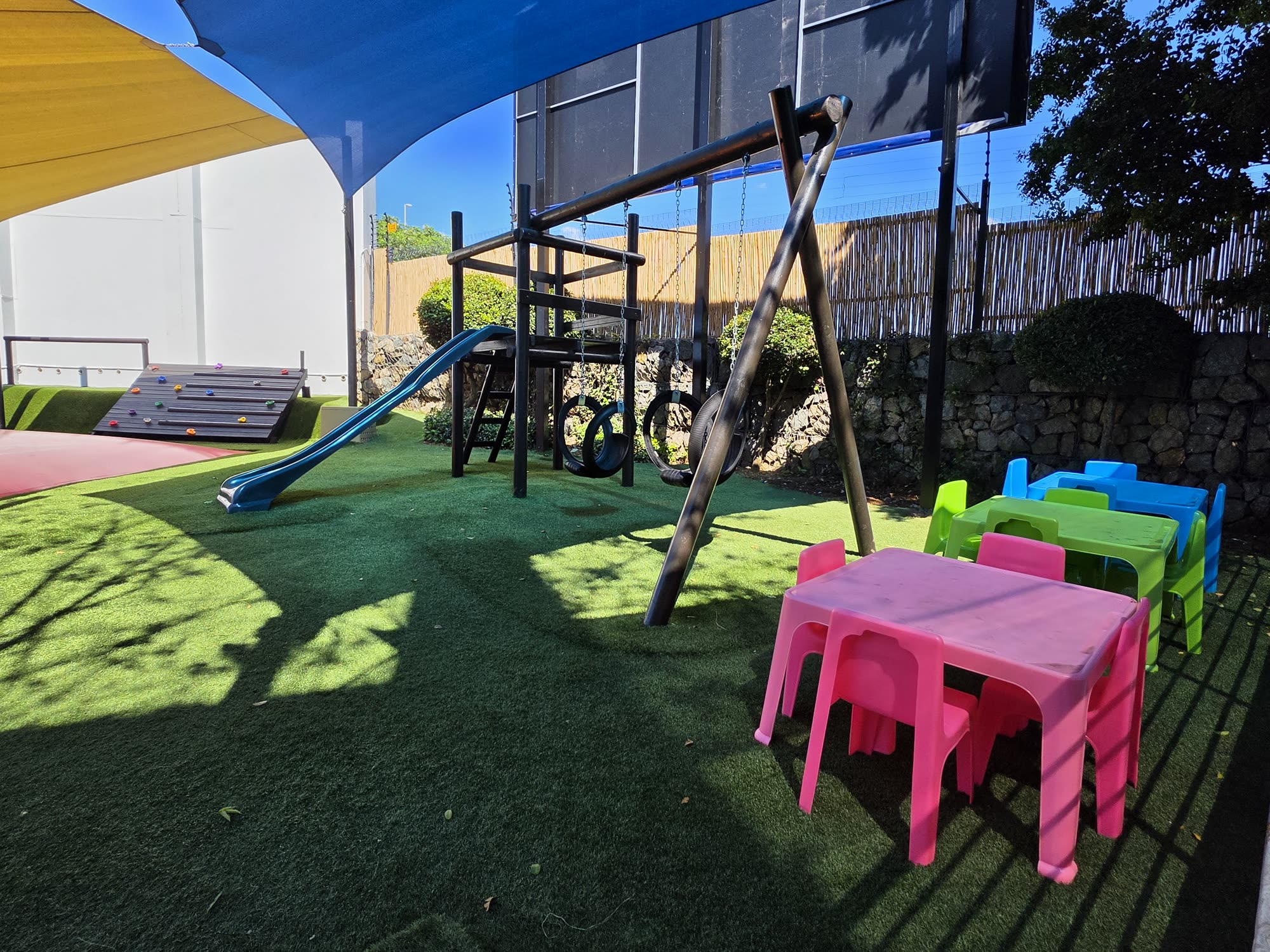 The slide and kids' tables